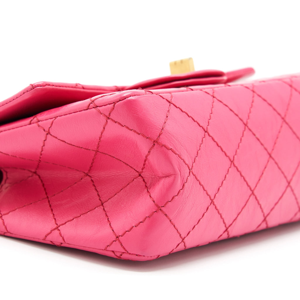 CHANEL MINI 2.55 REISSUE FLAP BAG AGED CALFSKIN HOT PINK GHW