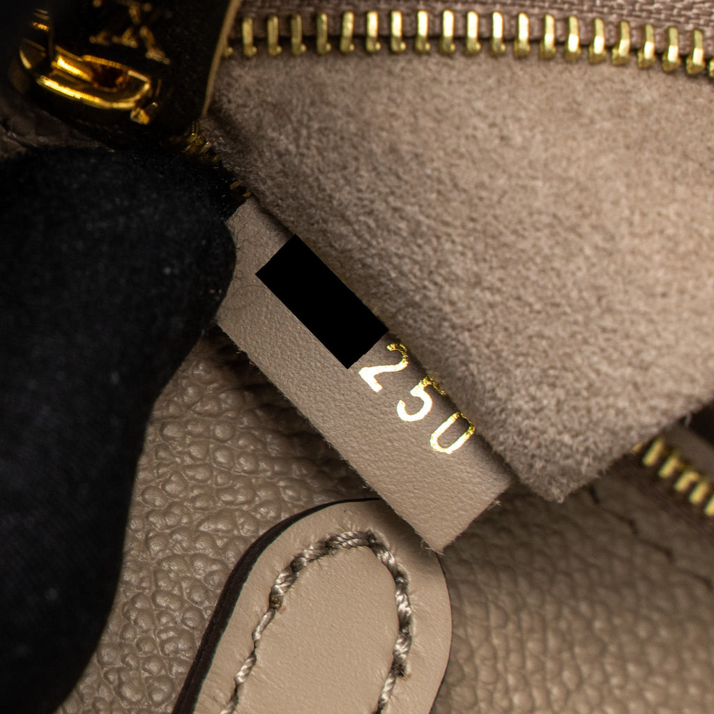 LOUIS VUITTON ON THE GO MM MONOGRAM EMPREINTE TOURTERELLE GHW