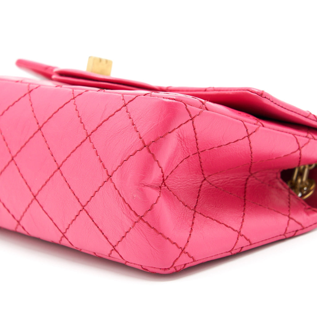 CHANEL MINI 2.55 REISSUE FLAP BAG AGED CALFSKIN HOT PINK GHW
