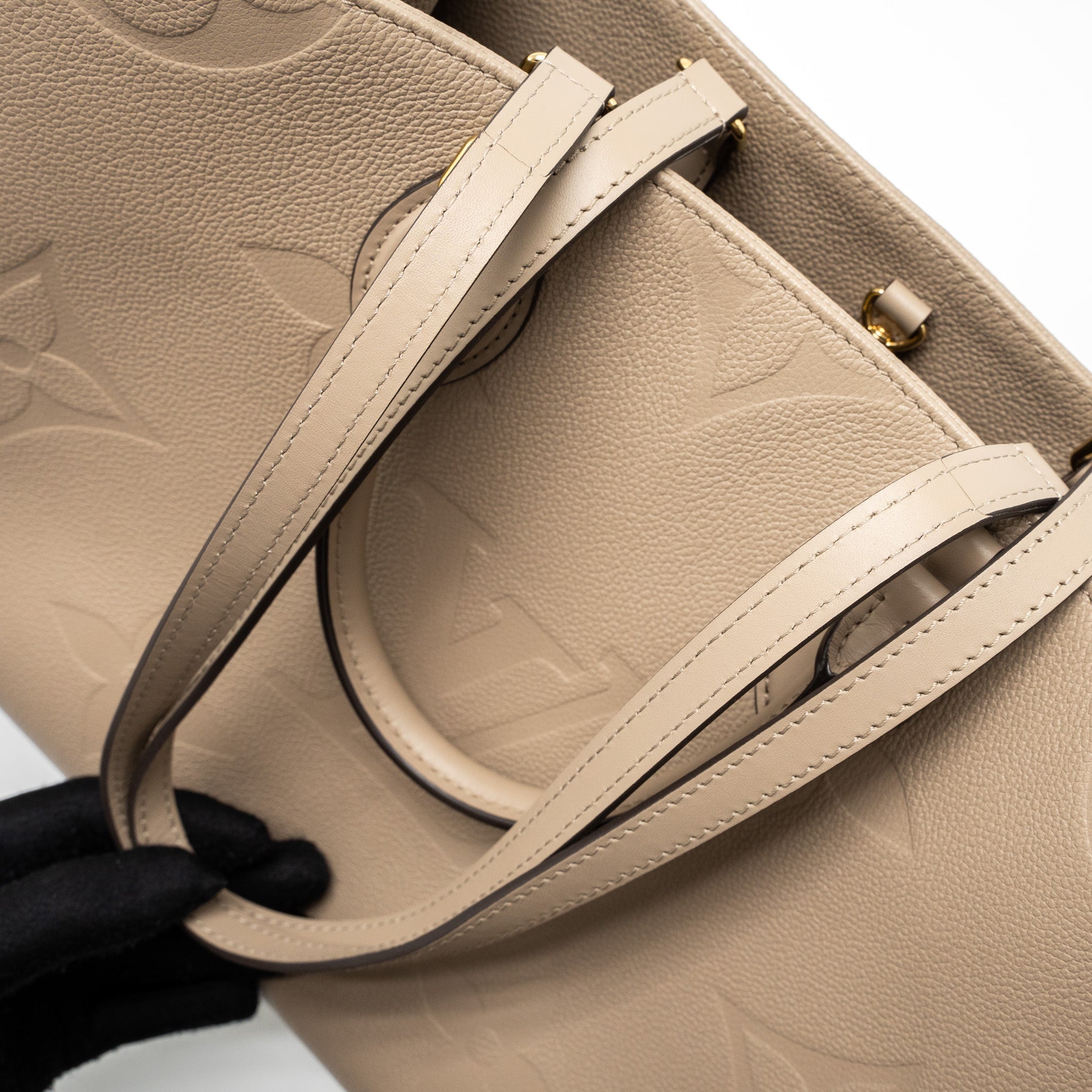 LOUIS VUITTON ON THE GO MM MONOGRAM EMPREINTE TOURTERELLE GHW
