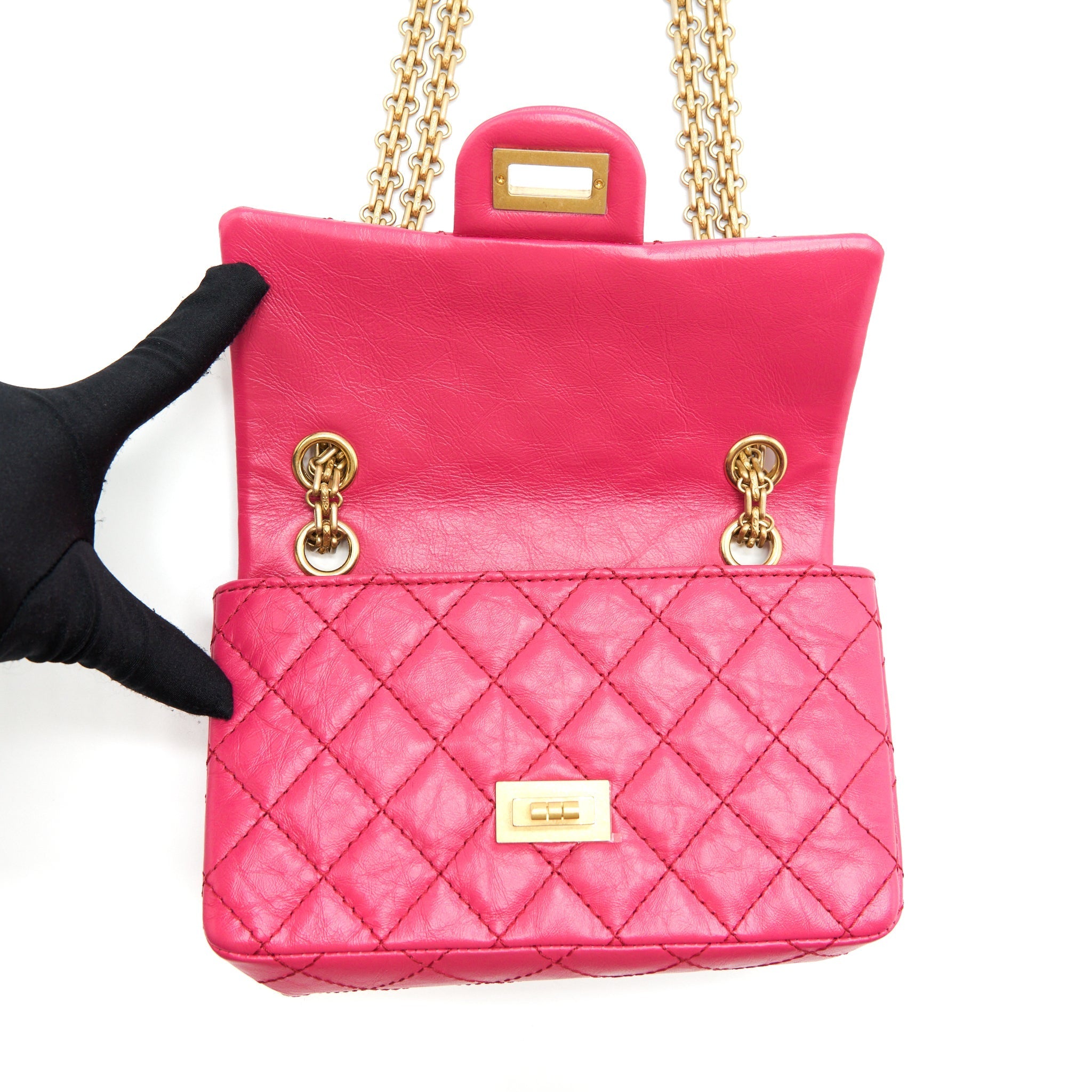 CHANEL MINI 2.55 REISSUE FLAP BAG AGED CALFSKIN HOT PINK GHW