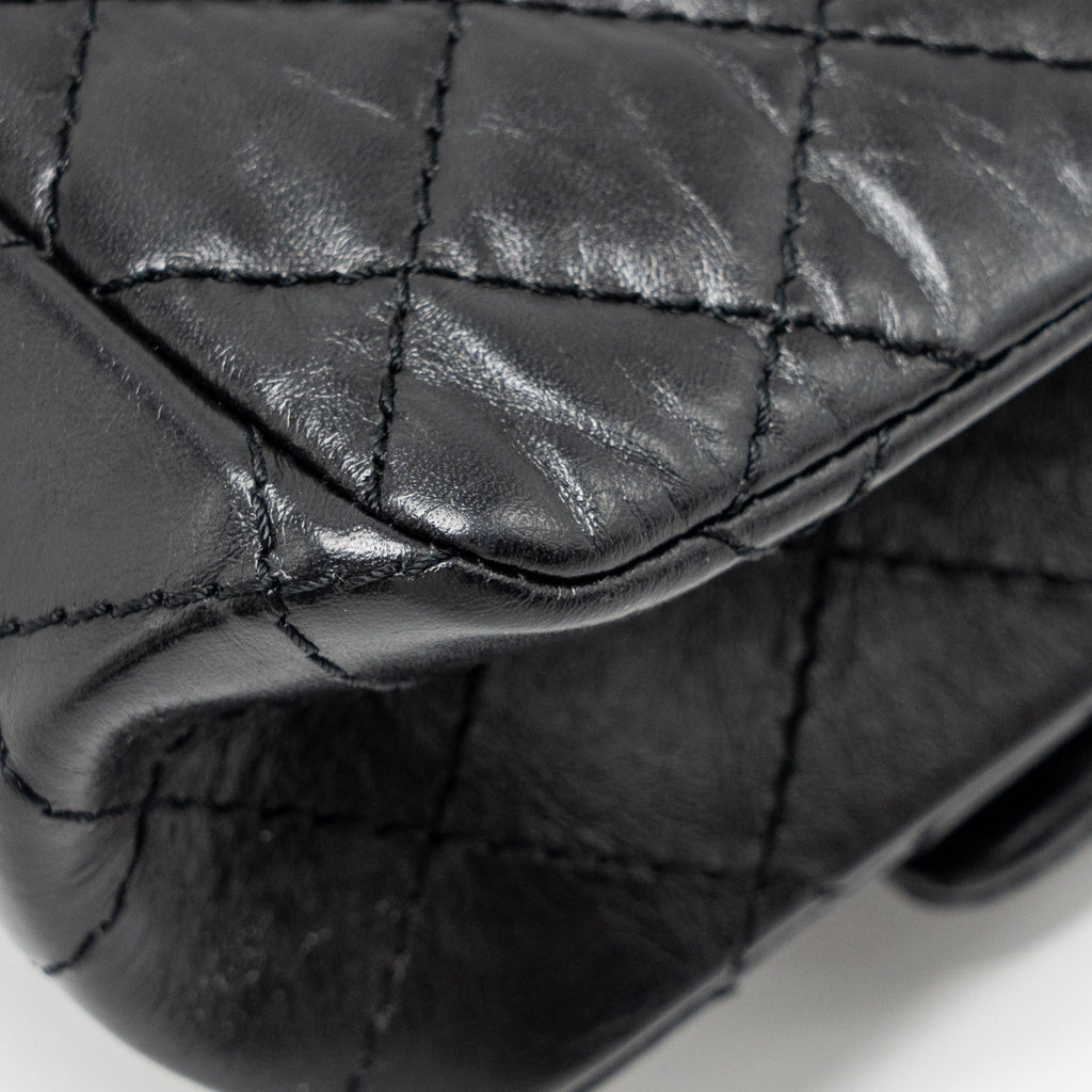 CHANEL SMALL 2.55 REISSUE FLAP BAG AGED CALFSKIN BLACK SHW