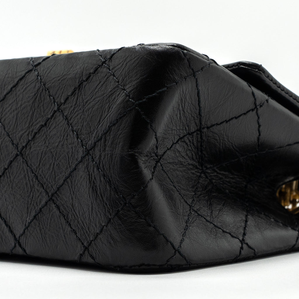 CHANEL MINI 2.55 REISSUE FLAP BAG AGED CALFSKIN BLACK GHW