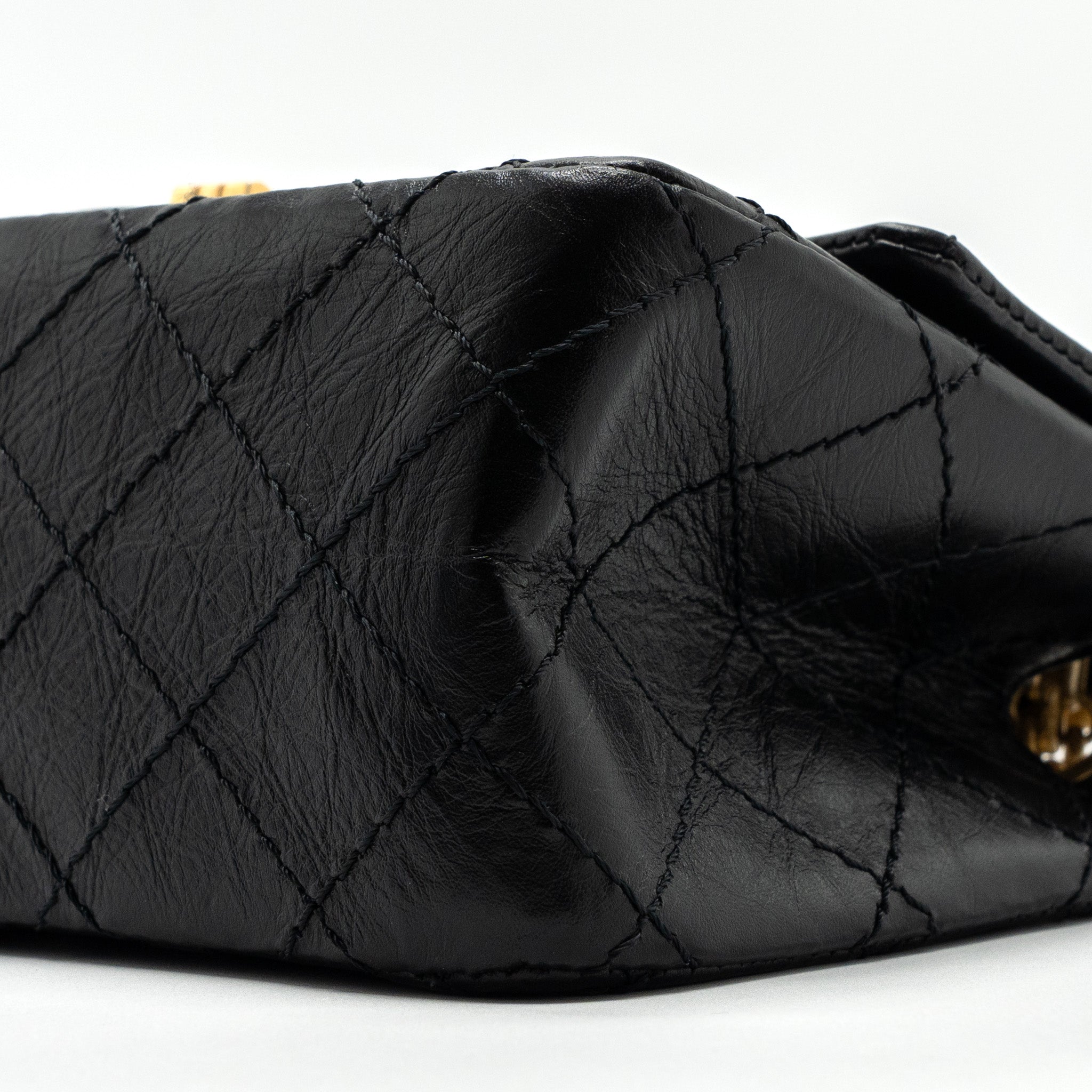 CHANEL MINI 2.55 REISSUE FLAP BAG AGED CALFSKIN BLACK GHW