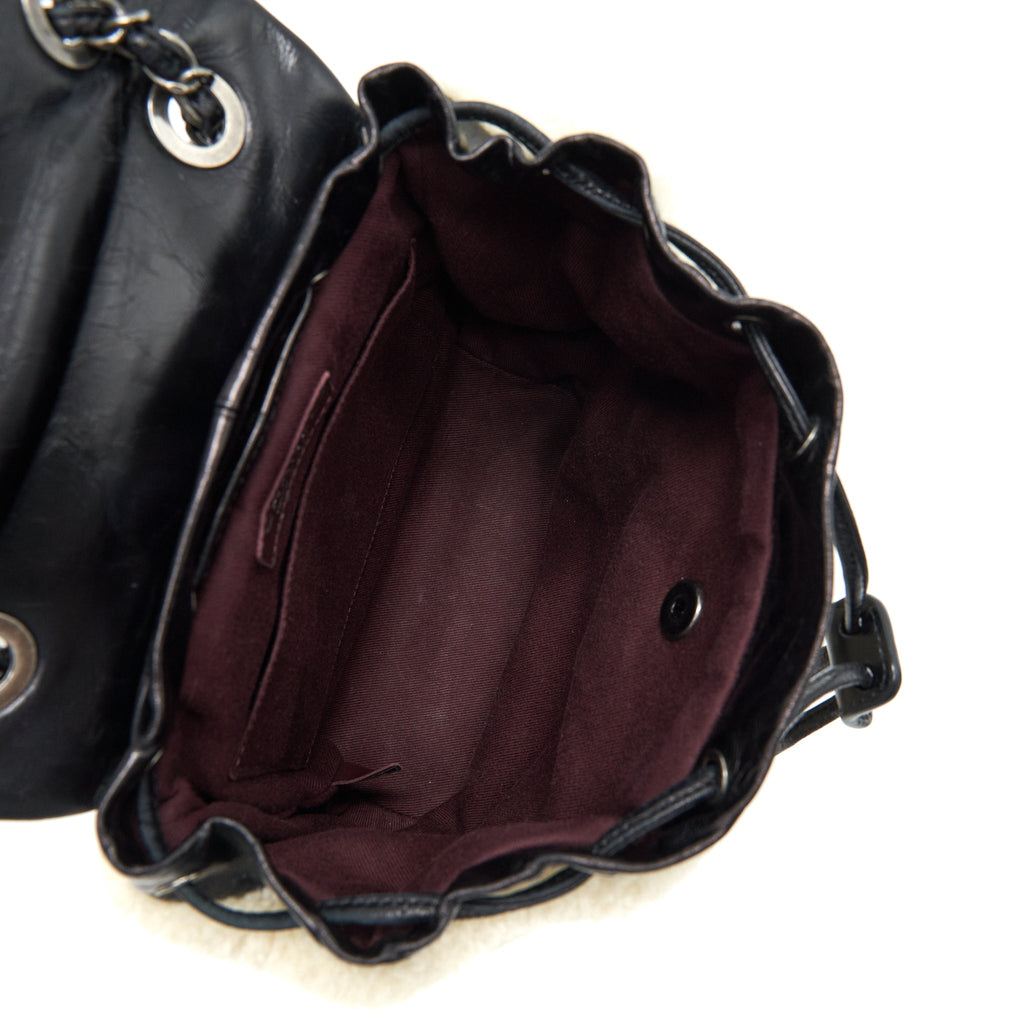 CHANEL MOUNTAIN SMALL BACKPACK SHEARLING WITH QUILTED CALFSKIN RUTHENIUM HARDWARE