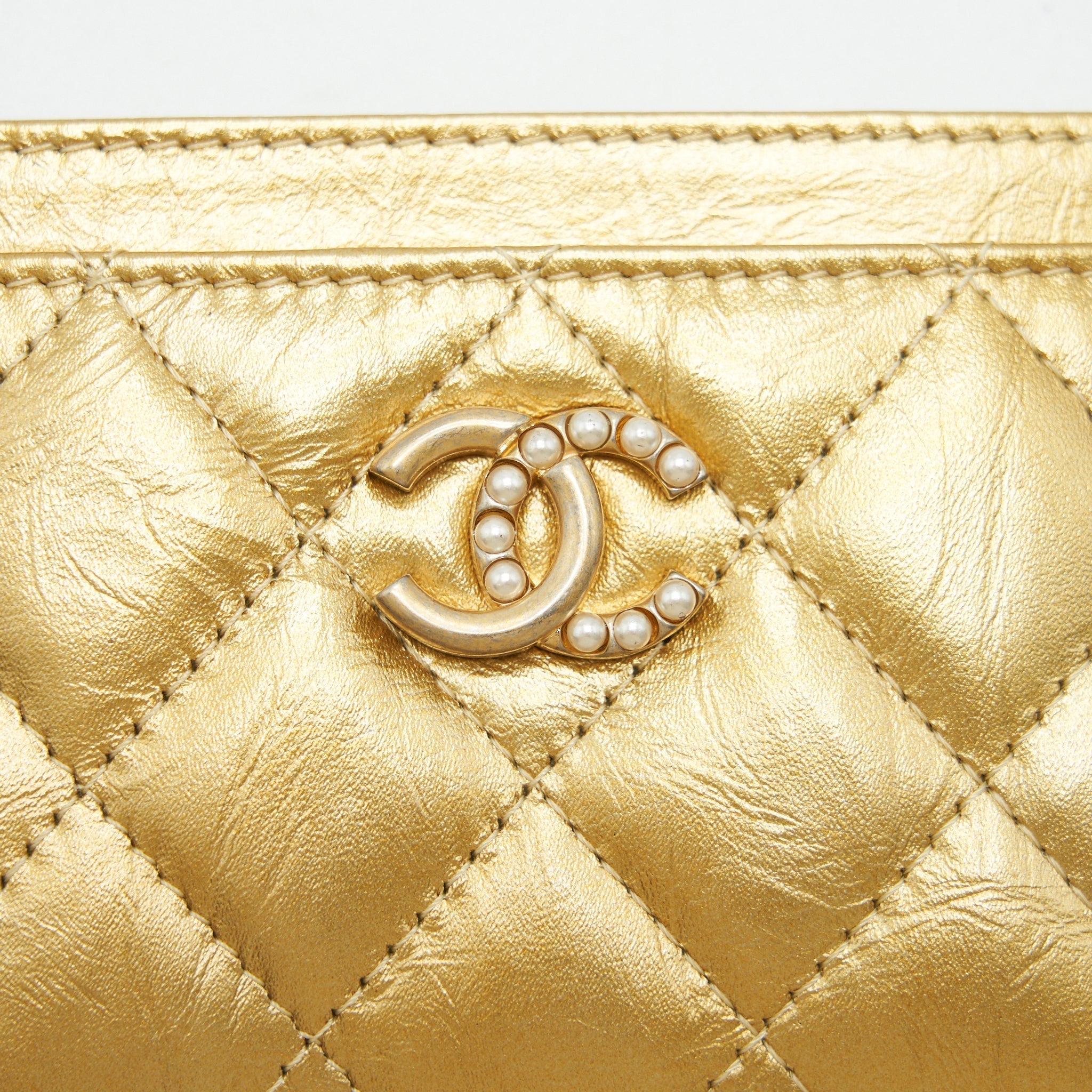 CHANEL QUILTED CARD HOLDER LAMBSKIN GOLD COLOUR WITH GOLD AND PEARL CC LOGO