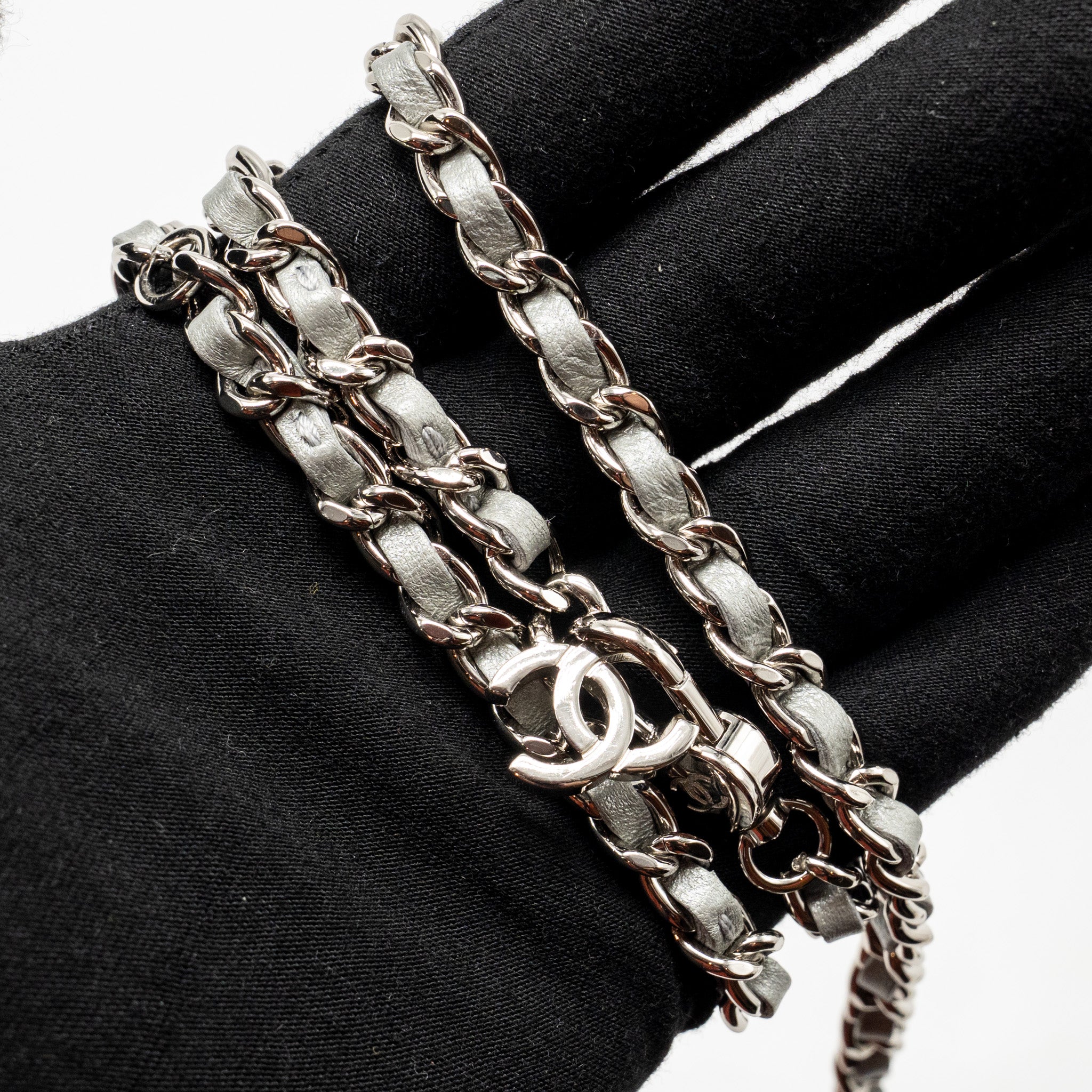 CHANEL 22A MINI STUDDED CHAIN BELT BAG WITH CRYSTAL METALLIC LAMBSKIN SILVER SHW (MICROCHIP)