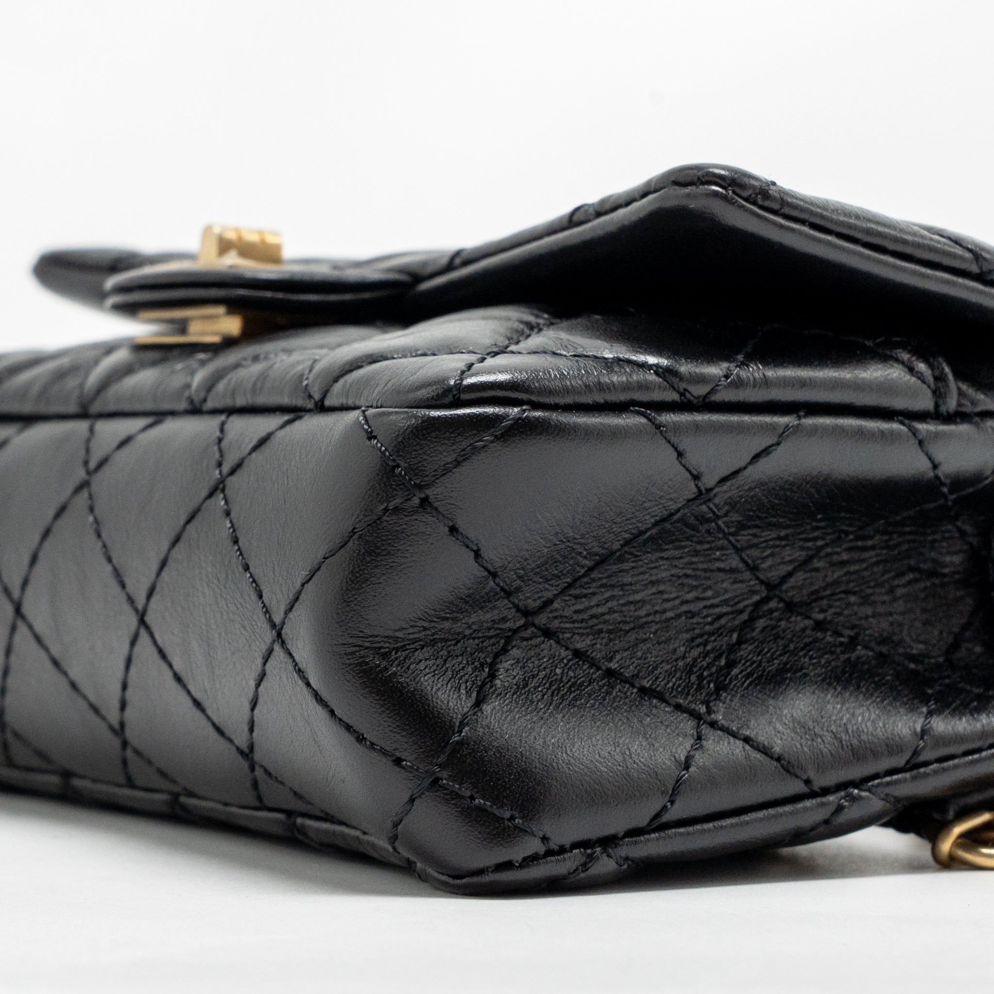 CHANEL 2.55 REISSUE WAIST BAG AGED CALFSKIN BLACK GHW