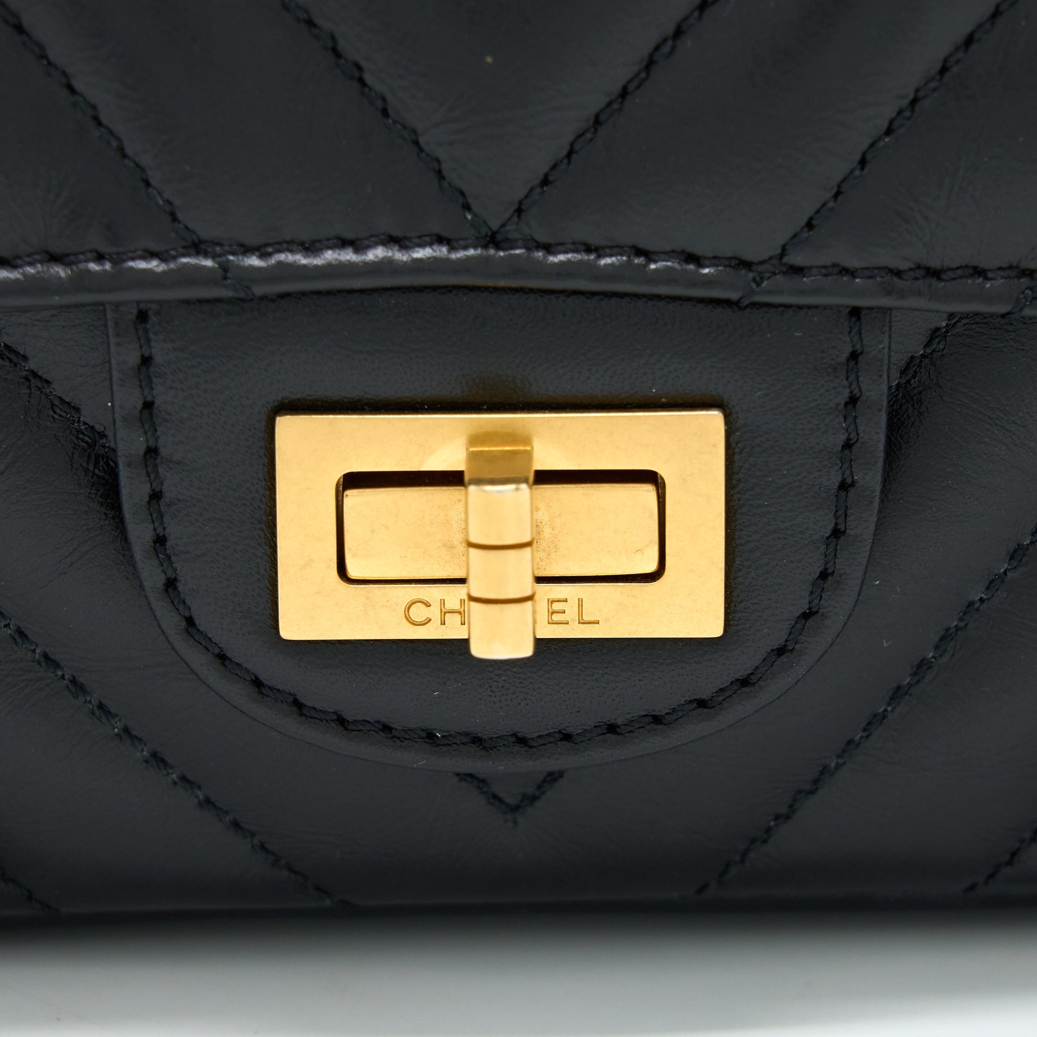 CHANEL 2.55 REISSUE MINI CHEVRON FLAP BAG AGED CALFSKIN  BLACK GHW