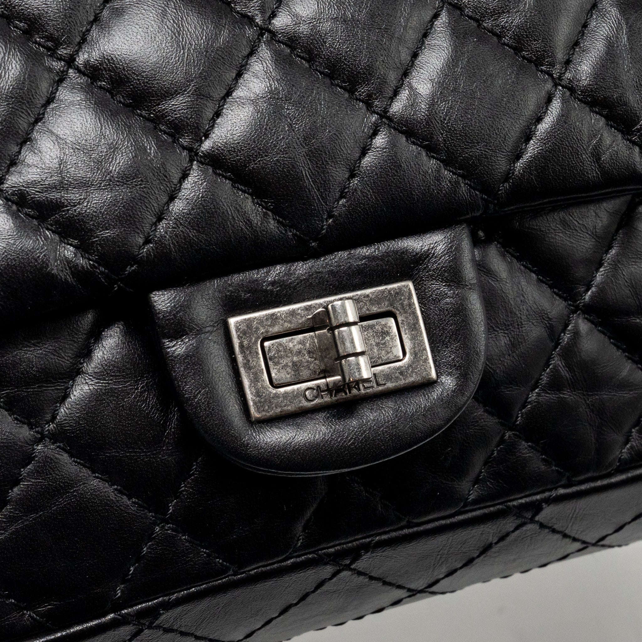 CHANEL SMALL 2.55 REISSUE FLAP BAG AGED CALFSKIN BLACK SHW