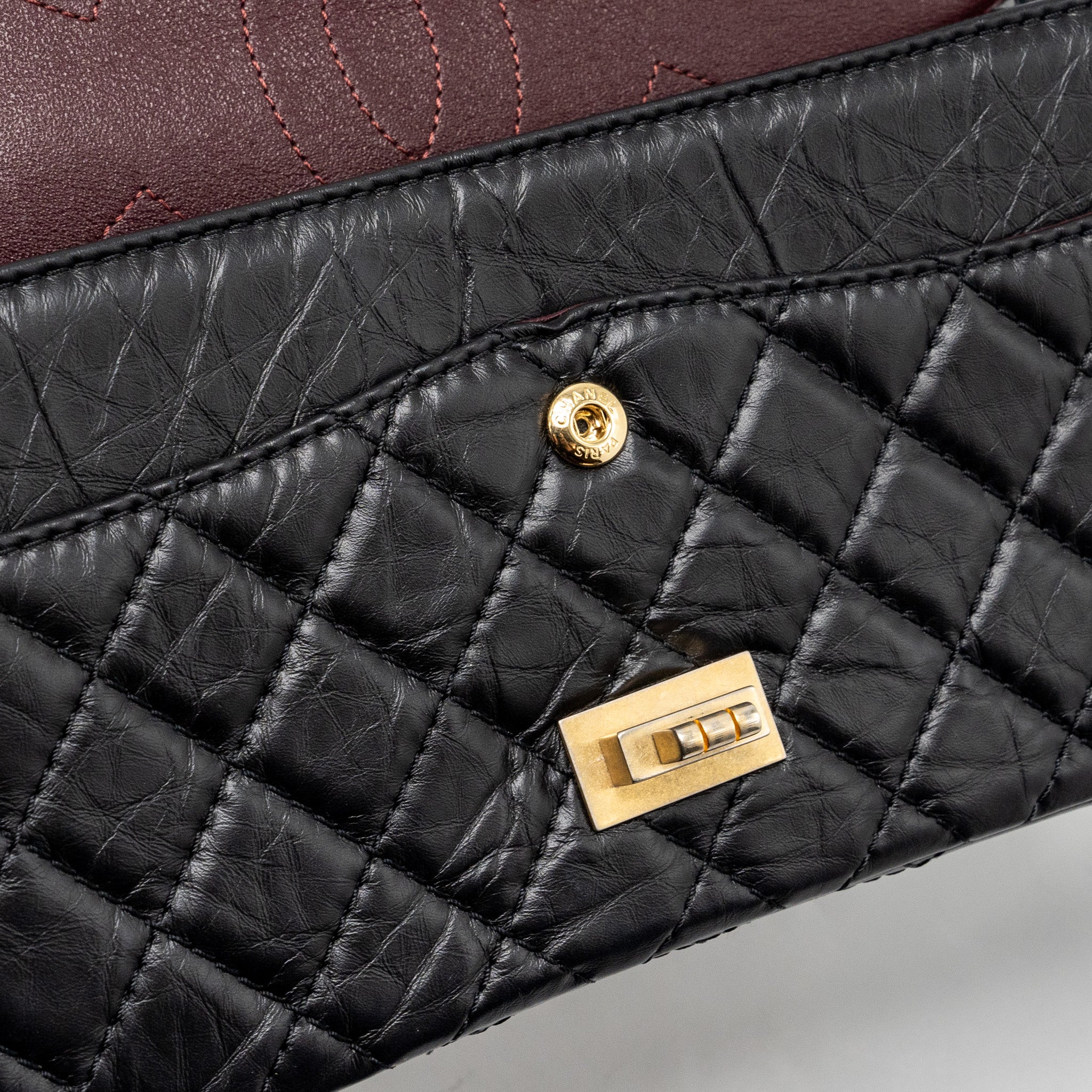 CHANEL SMALL 2.55 REISSUE DOUBLE FLAP BAG AGED CALFSKIN BLACK GHW
