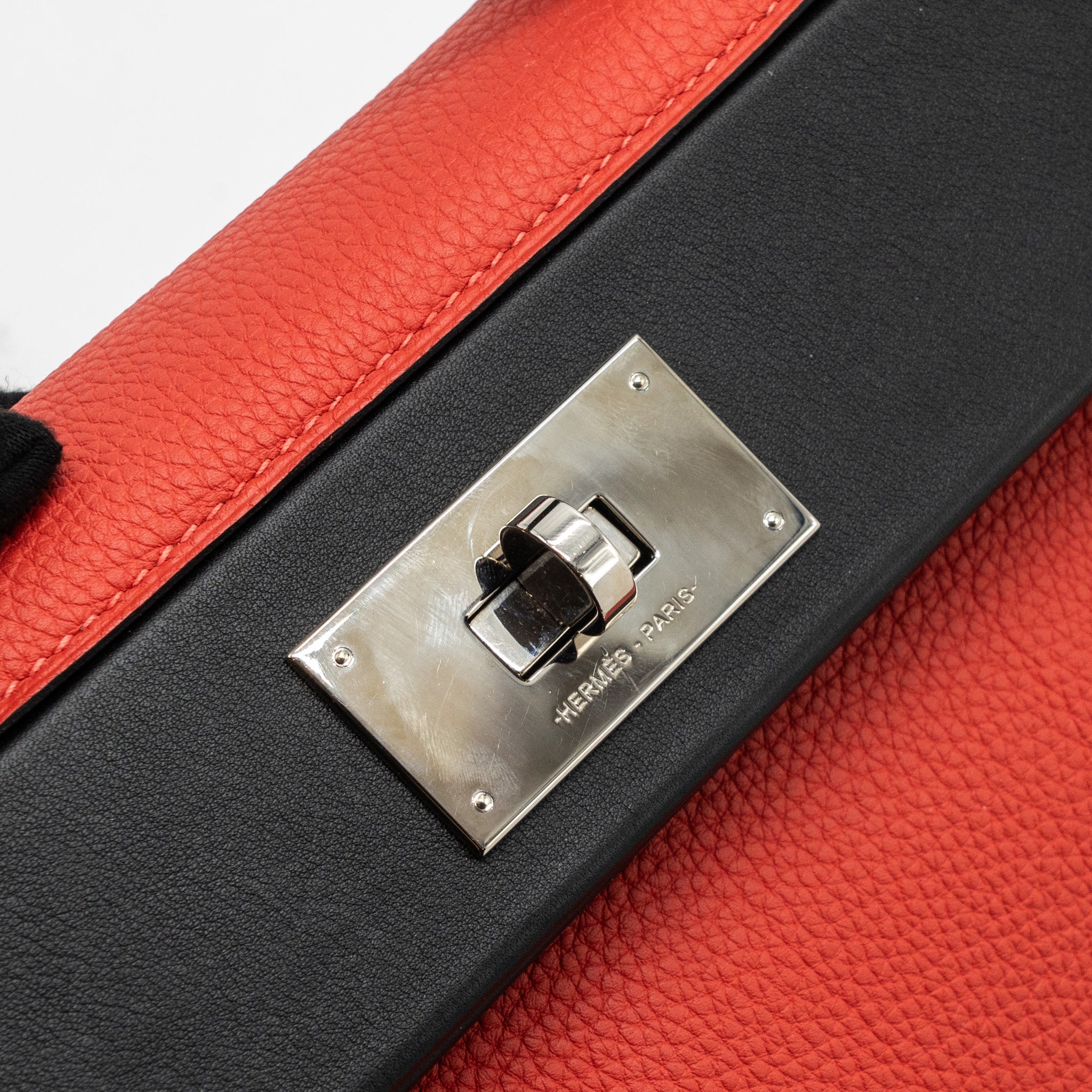 HERMES 24/24-29 BAG CLEMENCE/ SWIFT ROUGE PIVOINE/NOIR SHW