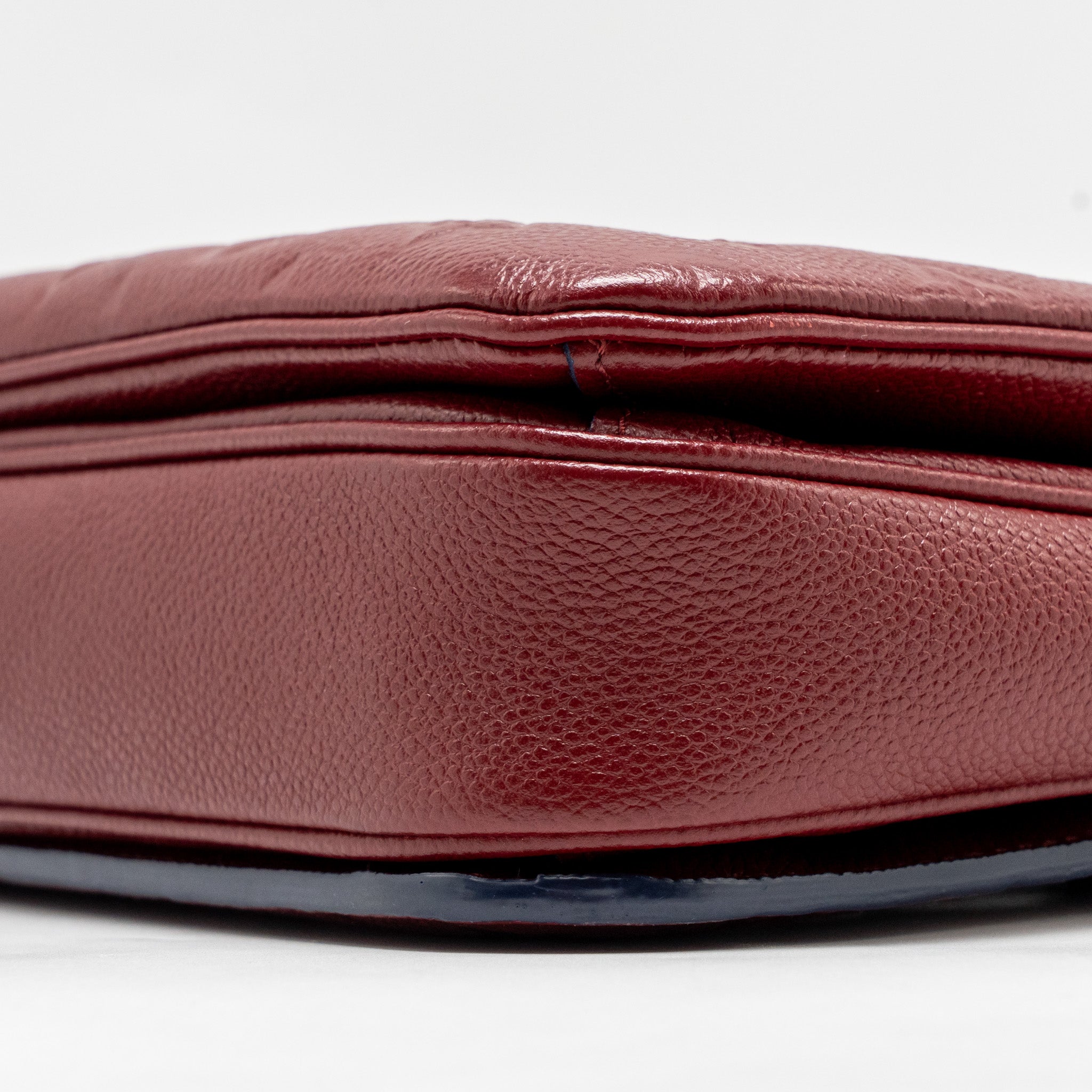 LOUIS VUITTON POCHETTE MÉTIS MONOGRAM EMPREINTE DARK RED GHW