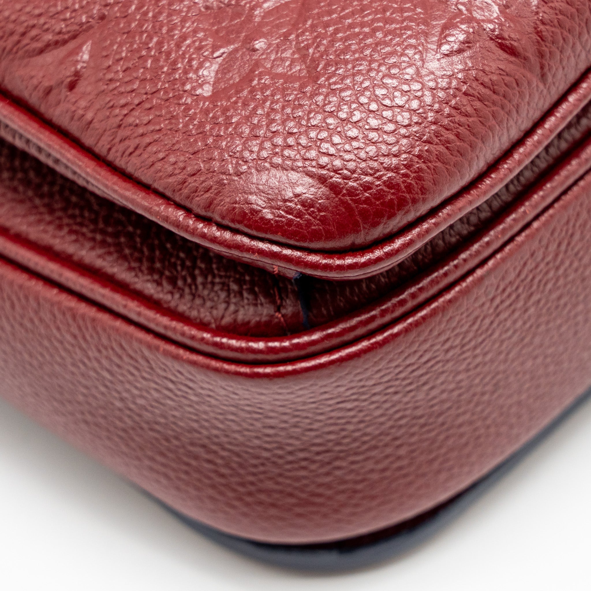 LOUIS VUITTON POCHETTE MÉTIS MONOGRAM EMPREINTE DARK RED GHW