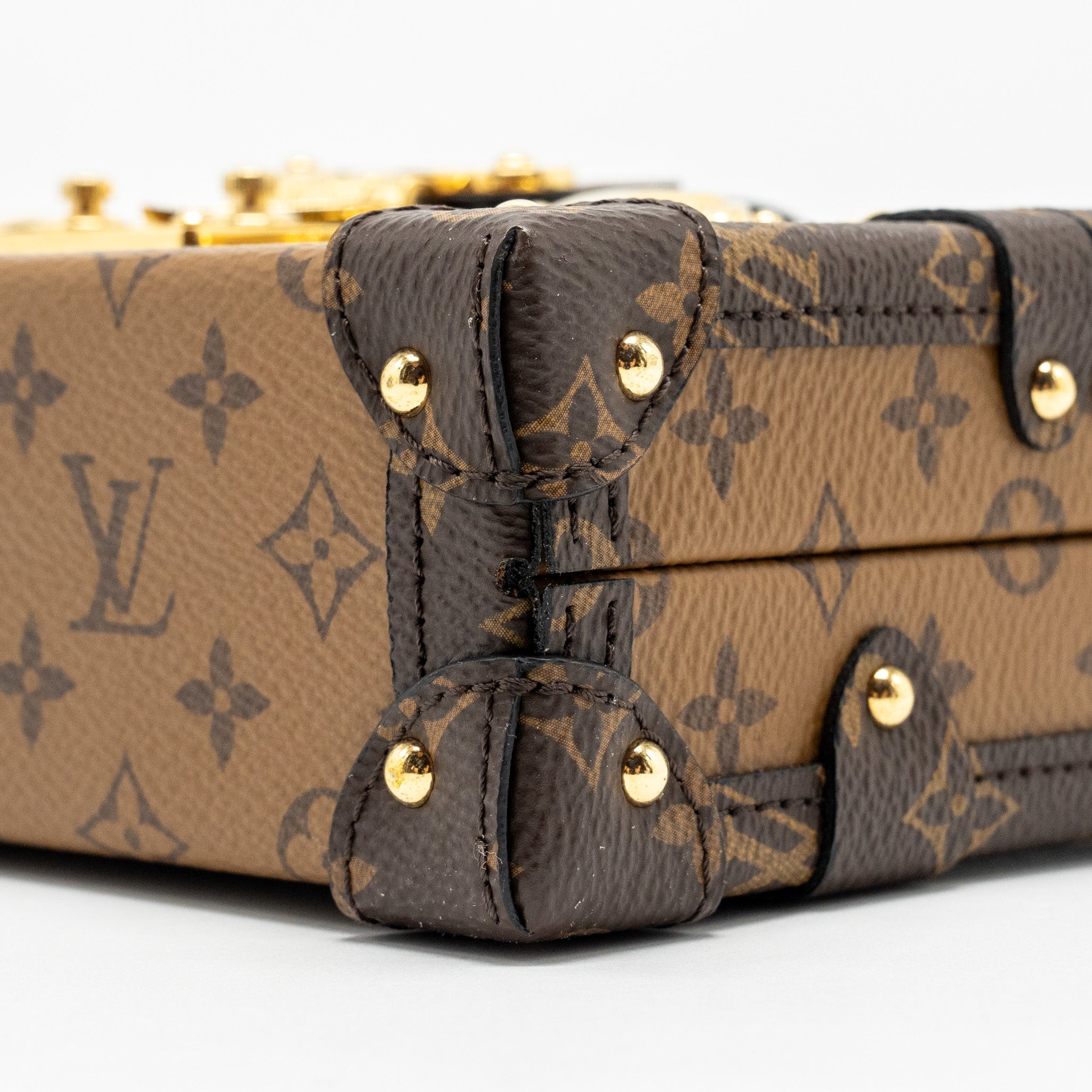 LOUIS VUITTON PETITE MALLE MONOGRAM REVERSE CANVAS GHW