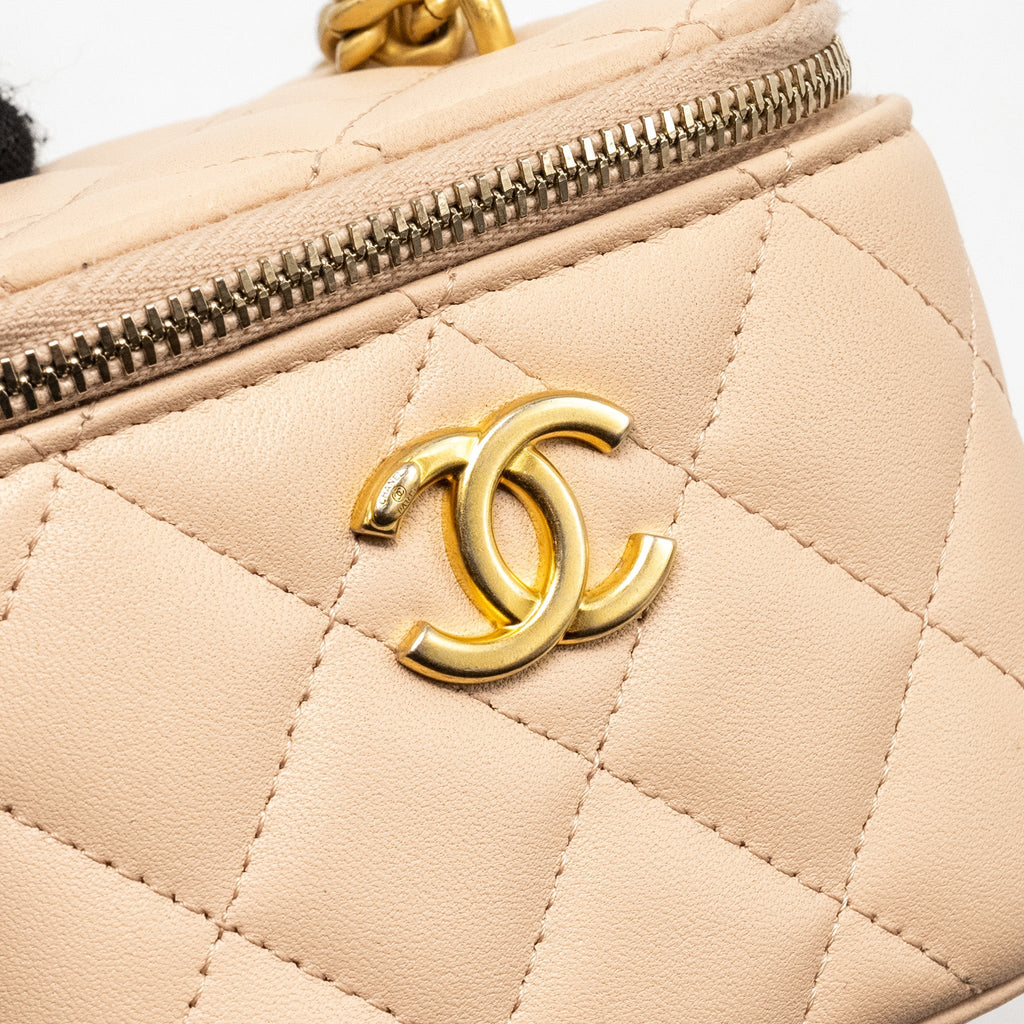 CHANEL MINI VANITY CASE WITH CAMELLIA ADJUSTABLE CHAIN LAMBSKIN BEIGE GHW (MICROCHIP)