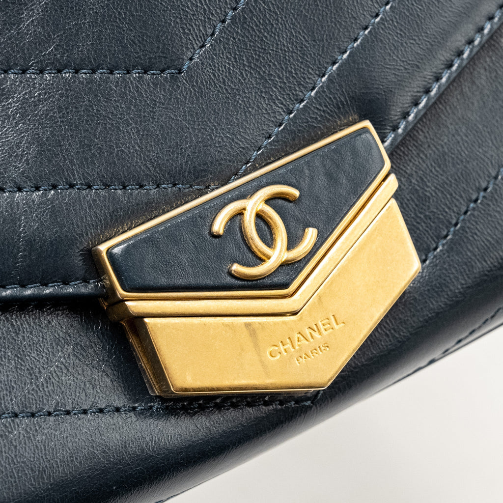 CHANEL LOCK ME UP CHEVRON MEDAL FLAP BAG CALFSKIN DARK NAVY GHW