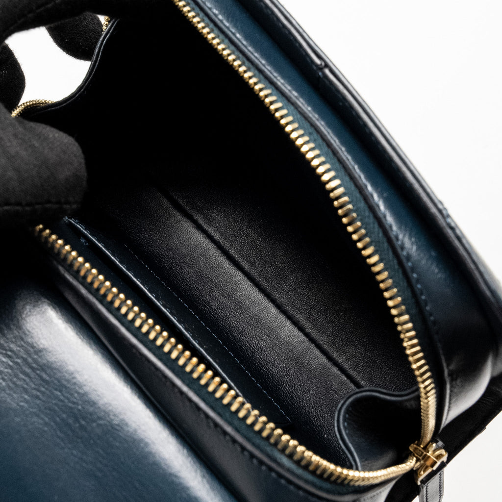 CHANEL LOCK ME UP CHEVRON MEDAL FLAP BAG CALFSKIN DARK NAVY GHW