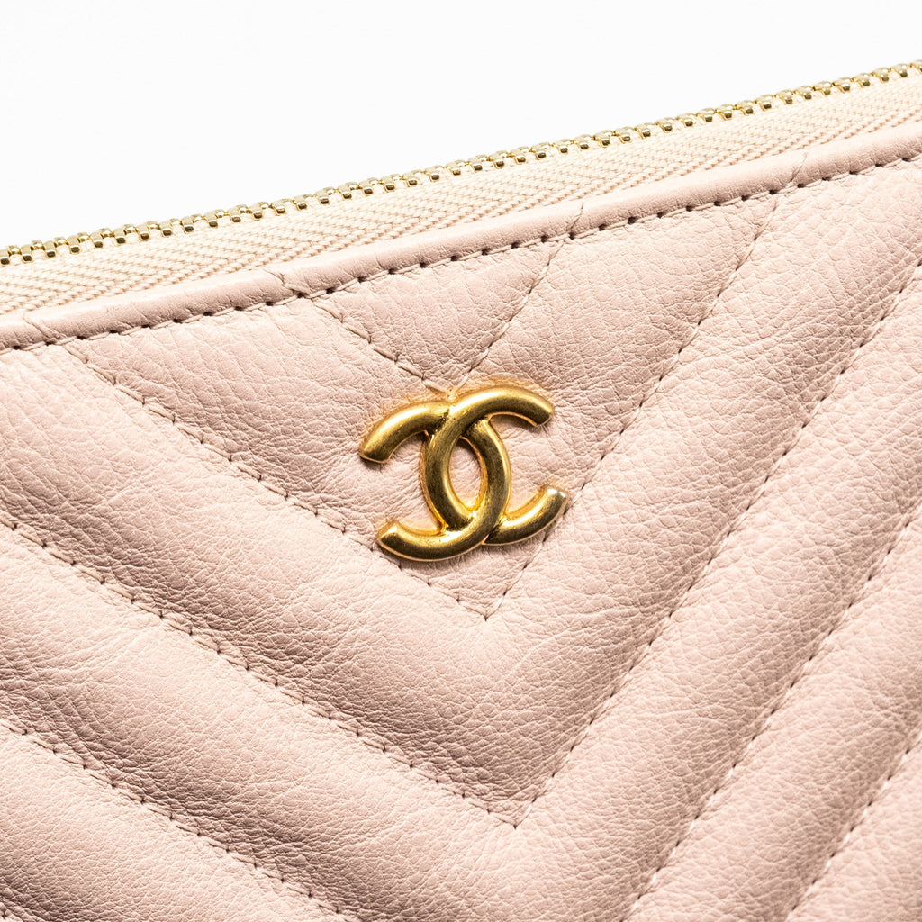 CHANEL CHEVRON ZIP CLUTCH CALFSKIN LIGHT PINK GHW