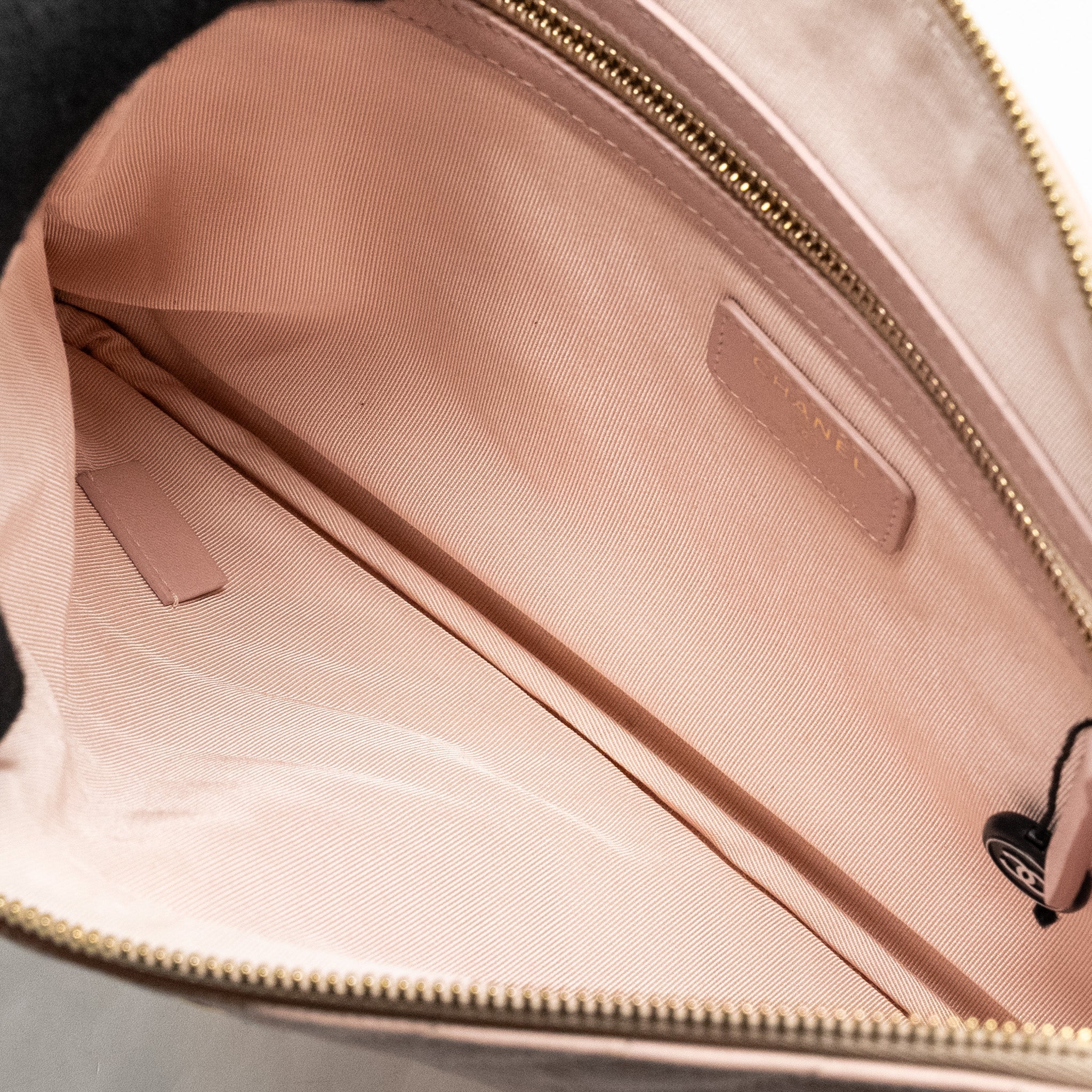 CHANEL CHEVRON ZIP CLUTCH CALFSKIN LIGHT PINK GHW